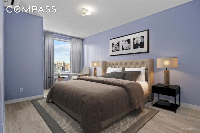 bedroom featuring light hardwood / wood-style floors