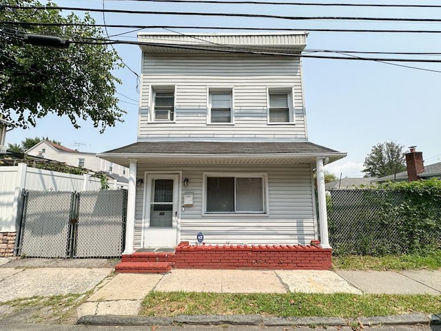 49 Steuben St, New York City, NY 10304 - view of front facade featuring covered porch and fence