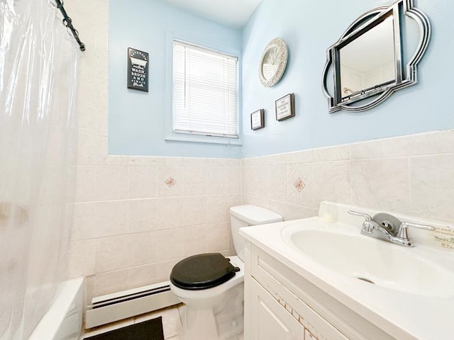 49 Steuben St, New York City, NY 10304 - full bathroom featuring a baseboard heating unit, toilet, tile walls, a wainscoted wall, and vanity