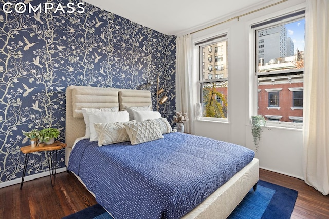 bedroom featuring dark wood-type flooring