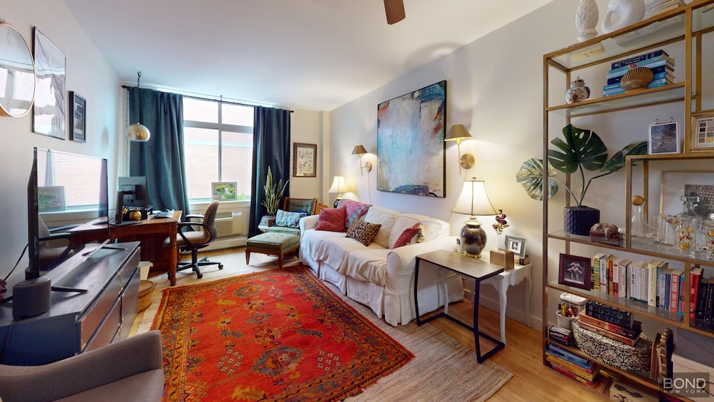 130 Bradhurst Ave Unit 614, New York City, NY 10039 - living room with an office area, wood finished floors, and ceiling fan