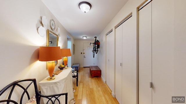 hallway featuring light wood-type flooring