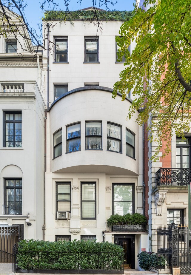 view of front of home with cooling unit