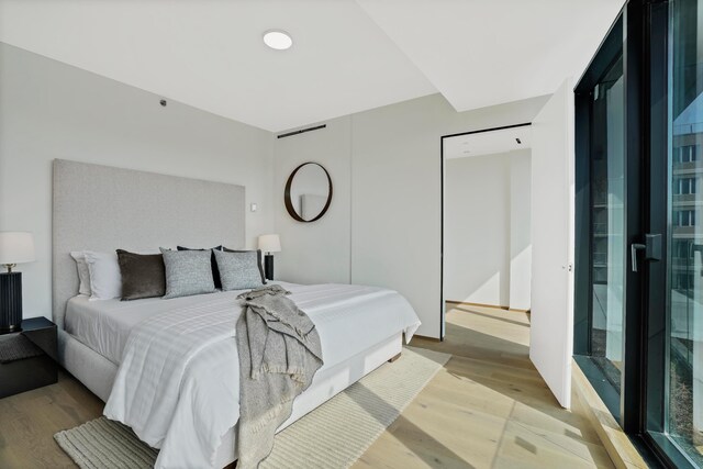 179 20th St Unit 8B, New York City, NY 11232 - bedroom with light wood-style floors