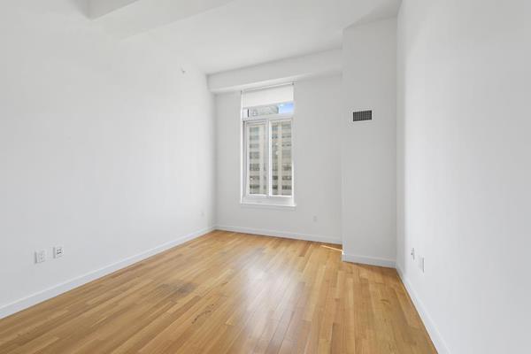 kitchen featuring appliances with stainless steel finishes, light hardwood / wood-style flooring, and sink