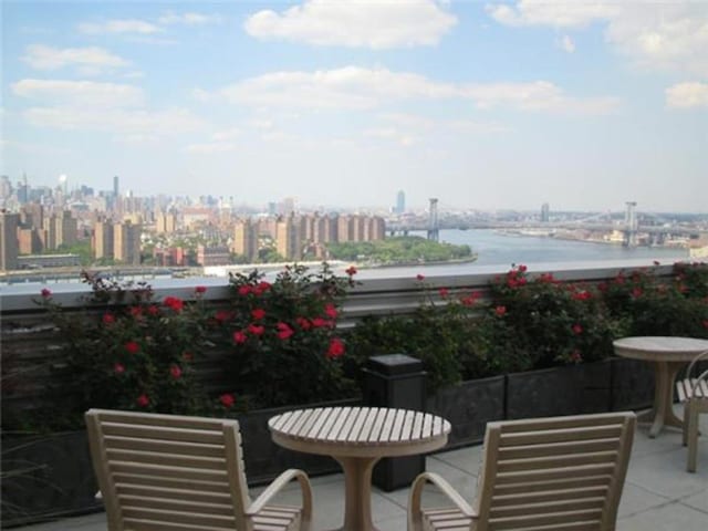 view of patio / terrace featuring a water view