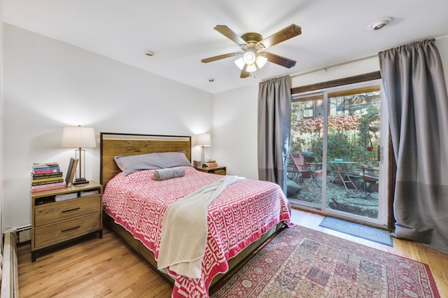 bedroom featuring light wood-type flooring, access to outside, and ceiling fan