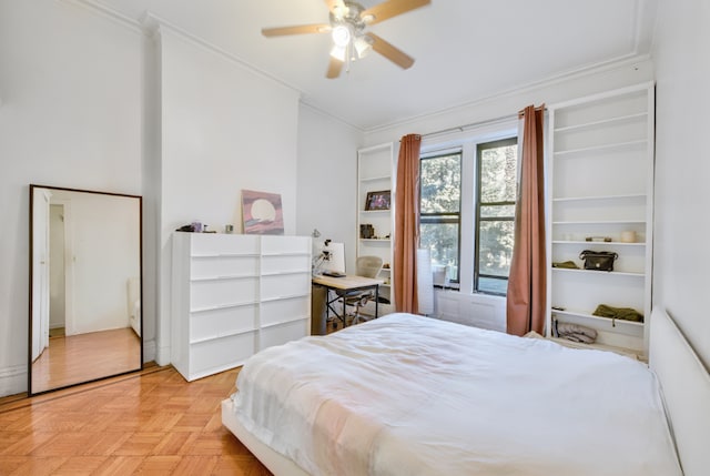 bedroom featuring ornamental molding and ceiling fan