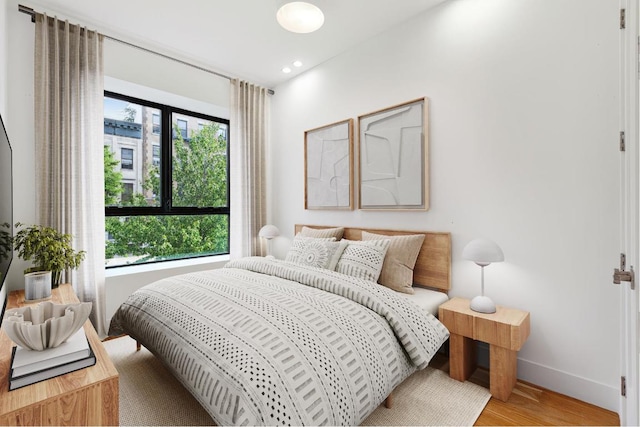 bedroom featuring light hardwood / wood-style floors