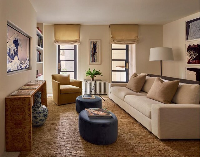 sitting room featuring hardwood / wood-style floors