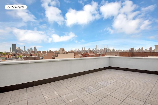 view of patio / terrace with a balcony