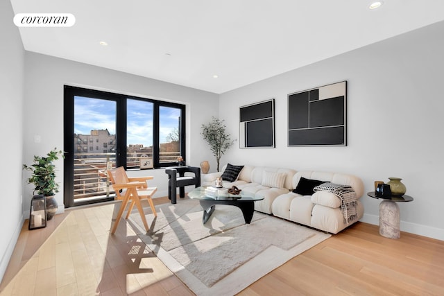 30-57 Crescent St Unit 3B, New York City, NY 11102 - living room with light wood-style floors and recessed lighting