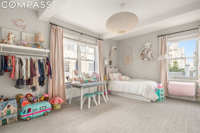 bedroom with a closet and carpet flooring