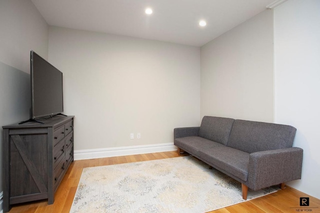 sitting room featuring light hardwood / wood-style floors