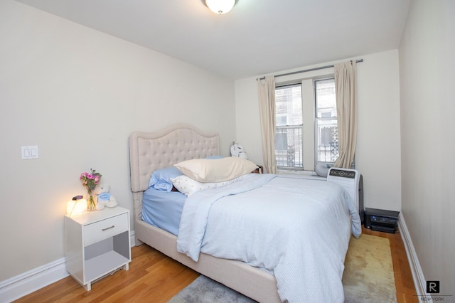 156-08 Riverside Dr W Unit 1-A, New York City, NY 10032 - bedroom with light wood-type flooring and baseboards