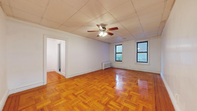 7101 Colonial Rd Unit R3H, New York City, NY 11209 - spare room with ceiling fan, baseboards, and radiator heating unit