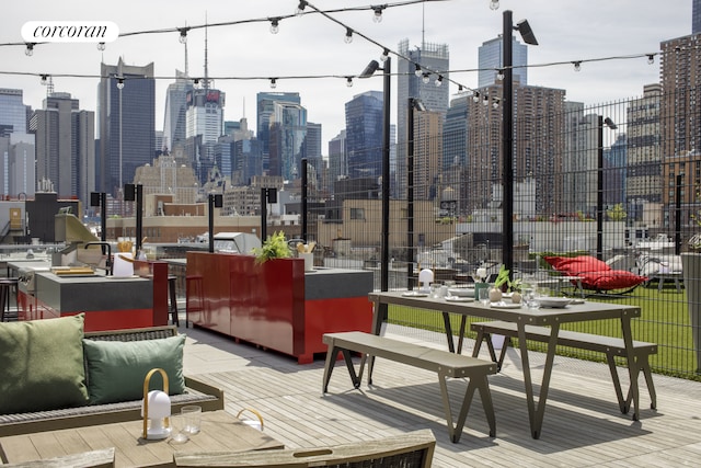 wooden terrace with a view of city