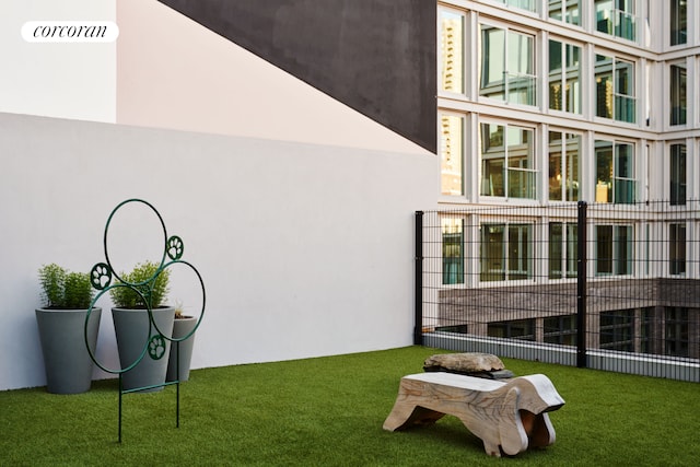 exterior space featuring a yard and stucco siding