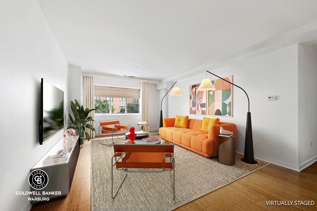 living room with wood-type flooring