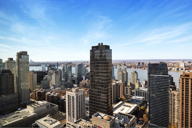 property's view of city featuring a water view