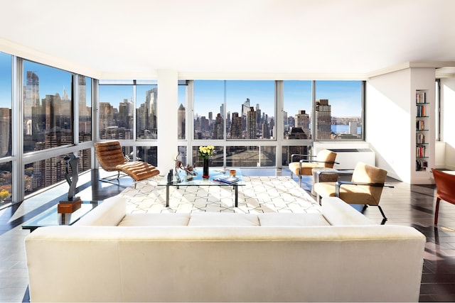 sunroom / solarium featuring a city view