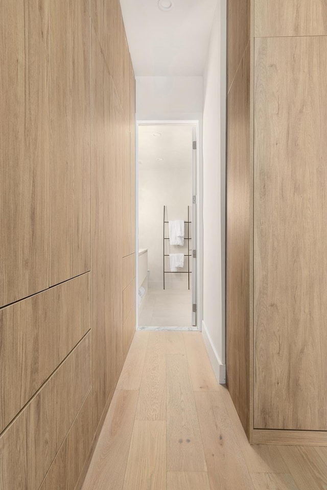 hallway with light wood-style flooring