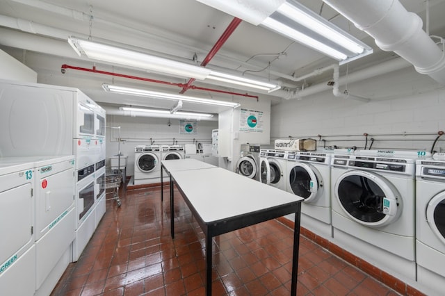 washroom with stacked washer / dryer and separate washer and dryer