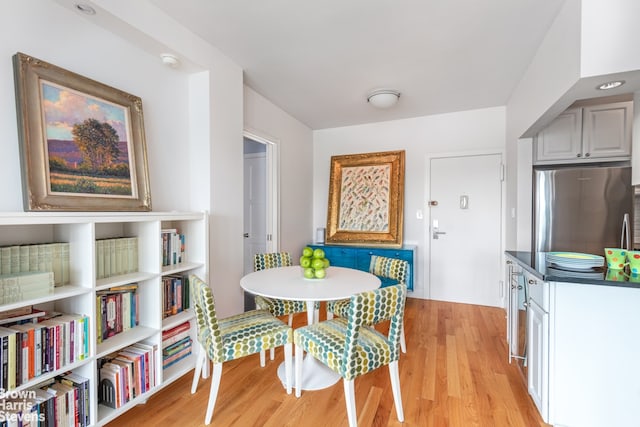 dining room with light wood finished floors