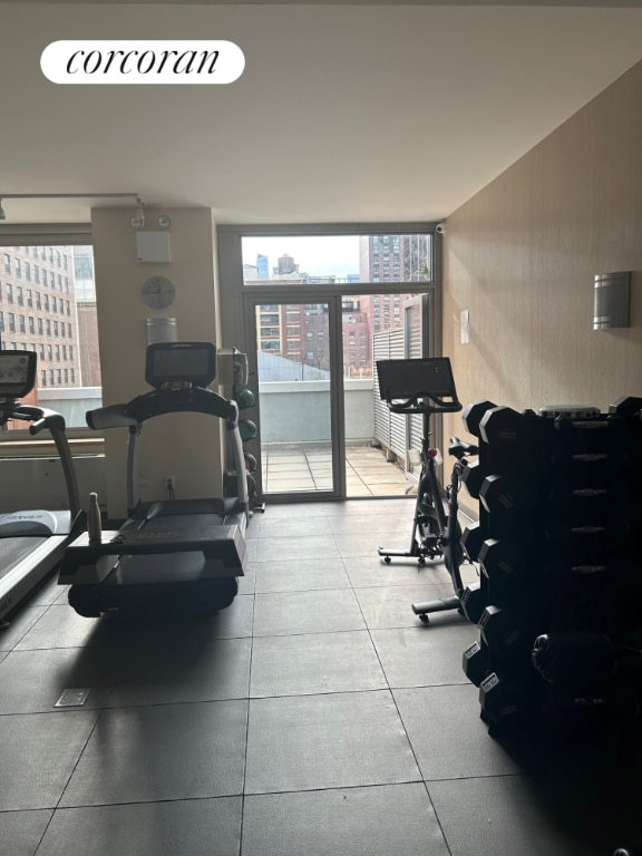 exercise room featuring a wall of windows