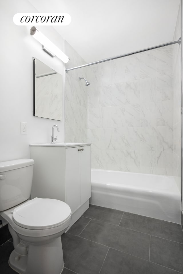 full bathroom with vanity, bathing tub / shower combination, tile patterned flooring, and toilet