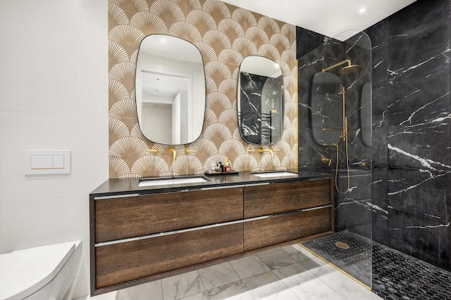 full bathroom with a marble finish shower, toilet, double vanity, and marble finish floor