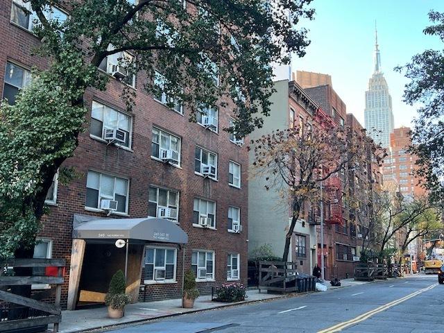 240 E 35th St Unit 9A, New York City, NY 10016 - view of building exterior featuring cooling unit