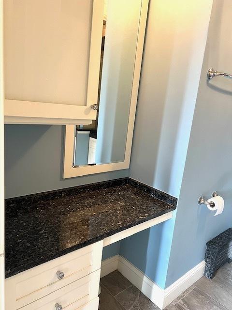 240 E 35th St Unit 9A, New York City, NY 10016 - bathroom featuring baseboards