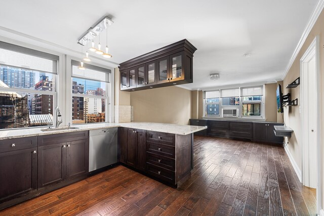 240 E 35th St Unit 9A, New York City, NY 10016 - kitchen featuring a peninsula, dark brown cabinetry, dark wood-style floors, a sink, and dishwasher