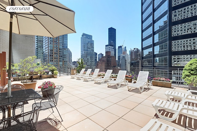 211 E 53rd St Unit 14A, New York City, NY 10022 - view of patio with a skyline view