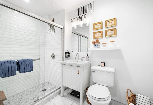 bathroom with vanity, radiator, toilet, and an enclosed shower