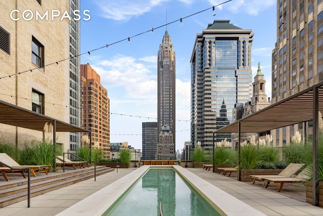 20 Pine St Unit 3204, New York City, NY 10005 - community pool featuring a city view
