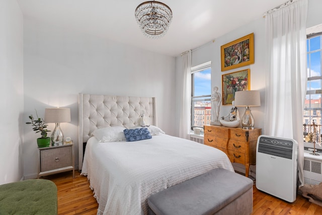 bedroom with light wood-style floors