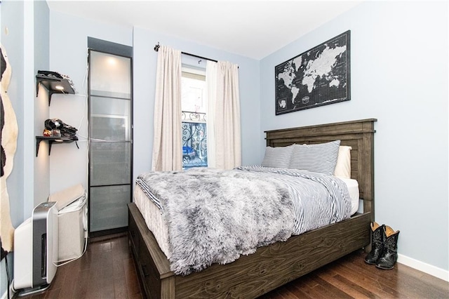 52 3rd Ave Unit 1A, New York City, NY 11217 - bedroom with hardwood / wood-style flooring and baseboards