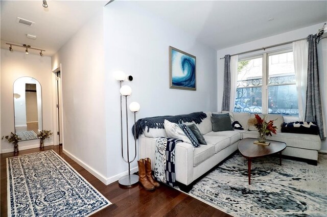 52 3rd Ave Unit 1A, New York City, NY 11217 - living area with wood finished floors, track lighting, and baseboards