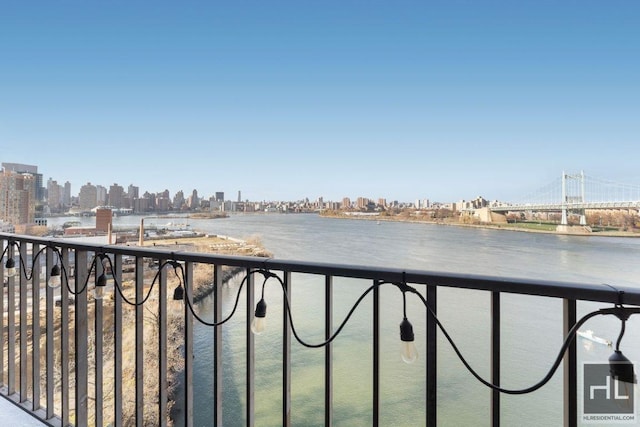 view of water feature with a city view