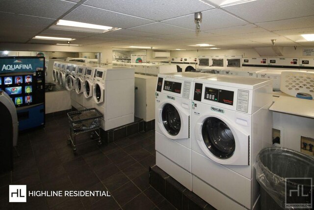 shared laundry area featuring washer and clothes dryer