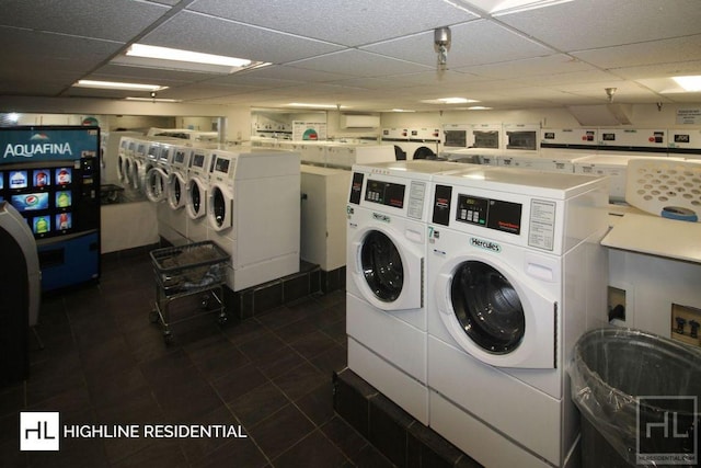 community laundry room featuring washing machine and dryer