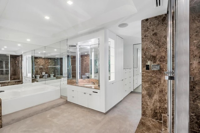 bathroom featuring vanity and a bathtub