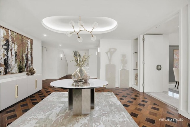 entryway featuring a tray ceiling