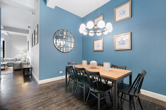 3 Hanover Sq Unit 13F, New York City, NY 10004 - dining room with a chandelier, baseboards, wood finished floors, and a high ceiling