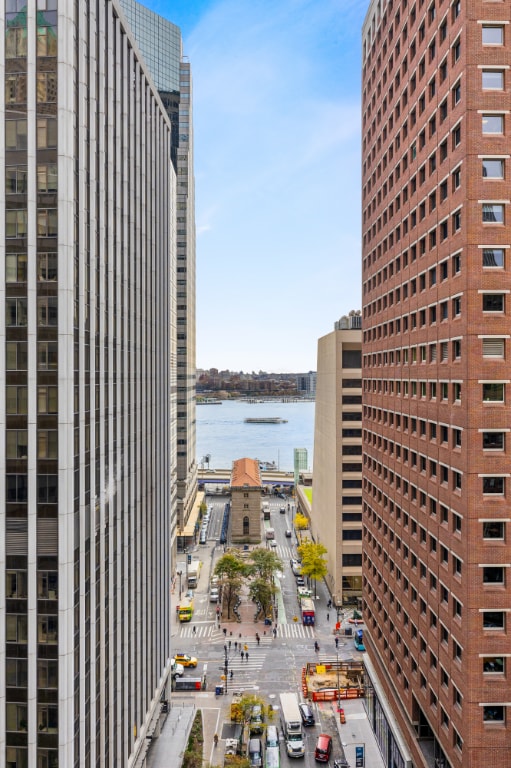 property's view of city featuring a water view