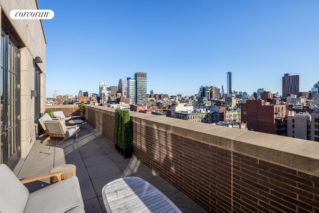 balcony featuring a city view