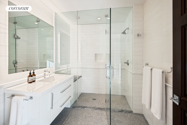 224 Mulberry St Ph, Ph, New York City, NY 10012 - bathroom featuring a stall shower, vanity, and tile patterned flooring