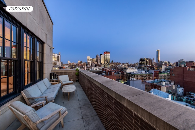 balcony featuring a city view